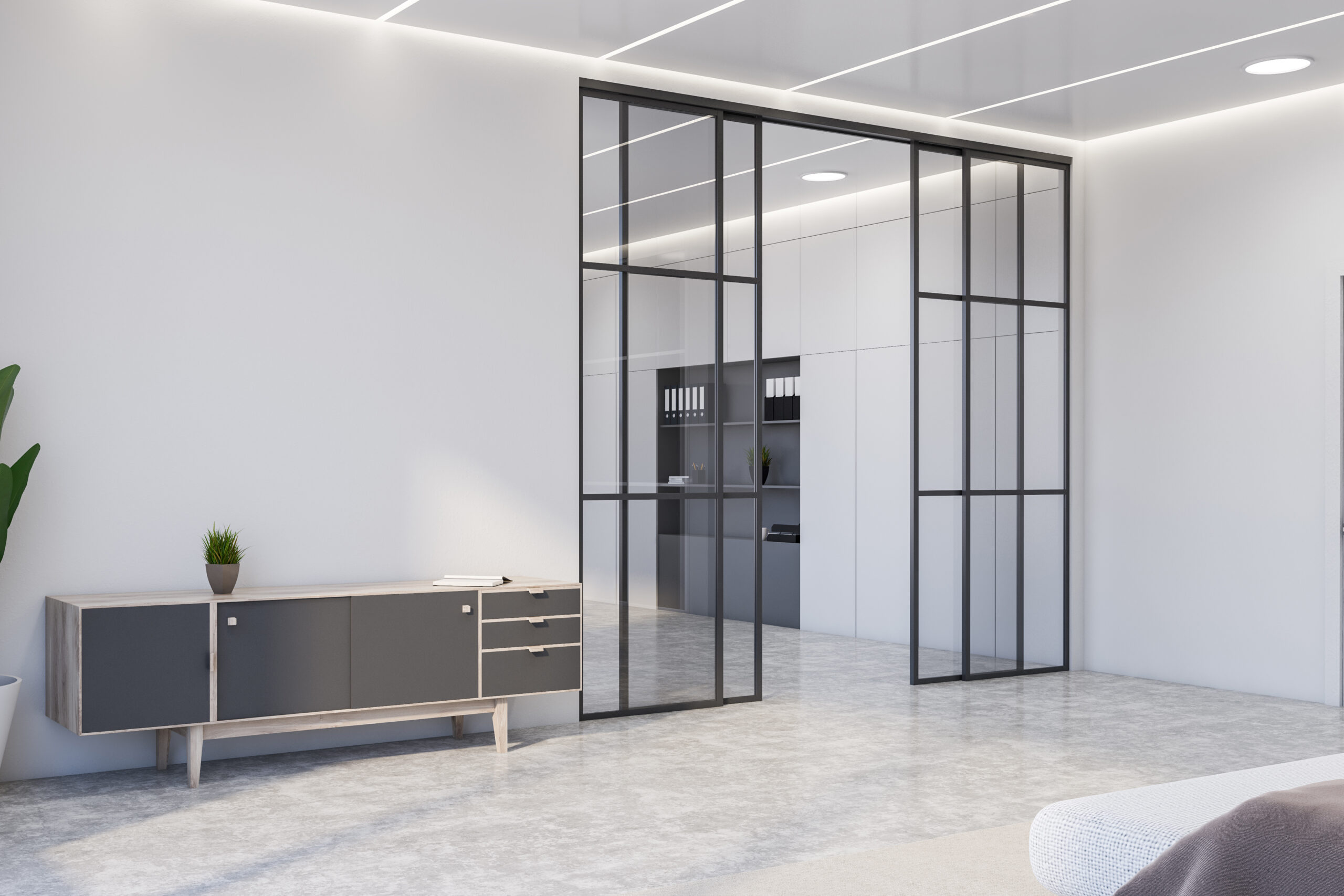 White living room corner with gray cabinet Corner of stylish living room with white walls, concrete floor, comfortable gray chest of drawers and home office with bookcase in background. 3d rendering