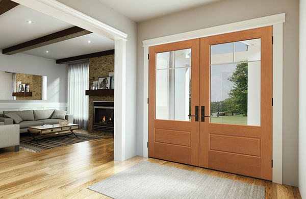 A stylish entryway with double wooden doors and a view of the outside garden.